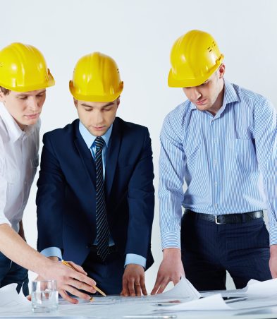 Image of young engineers working with the business project at the workplace